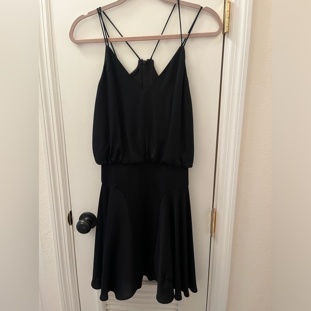 This little dress is brand, new, soft and cozy